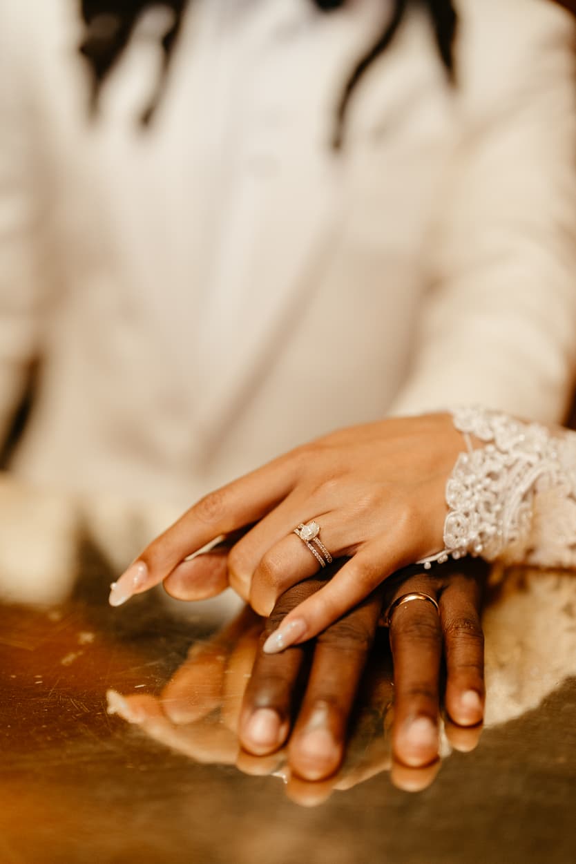 Destination elopement wedding Hotel Particulier Montmartre, Paris couple's editorial photo in the bar detail hands