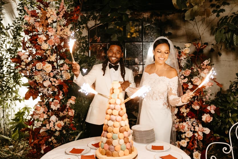 Destination elopement wedding Hotel Particulier Montmartre, Paris couple with Croquembouche and sparkles
