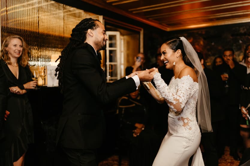 Destination elopement wedding Hotel Particulier Montmartre, Paris bride dancing with brother