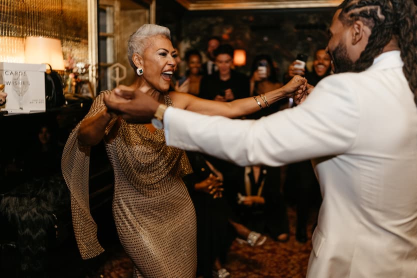 Destination elopement wedding Hotel Particulier Montmartre, Paris groom dancing with mom