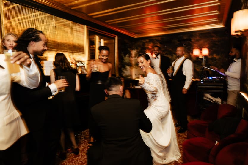 Destination elopement wedding Hotel Particulier Montmartre, Paris couple and guests dancing