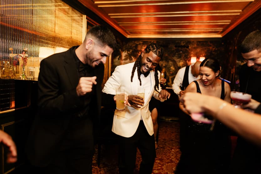 Destination elopement wedding Hotel Particulier Montmartre, Paris couple and guests dancing