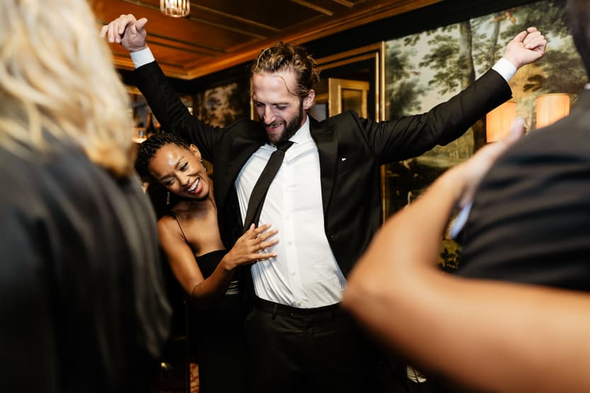 Destination elopement wedding Hotel Particulier Montmartre, Paris couple and guests dancing