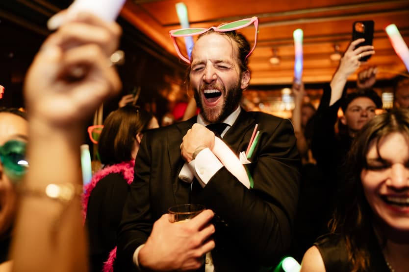 Destination elopement wedding Hotel Particulier Montmartre, Paris couple and guests dancing