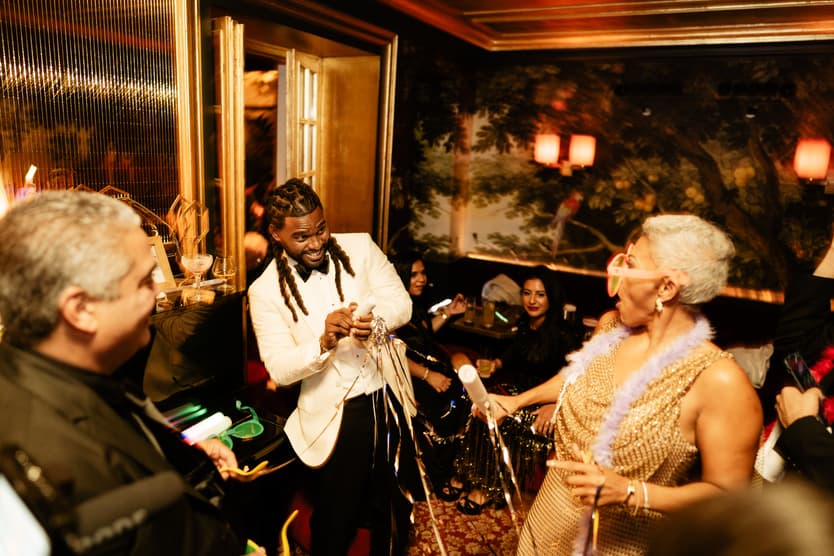 Destination elopement wedding Hotel Particulier Montmartre, Paris couple and guests dancing
