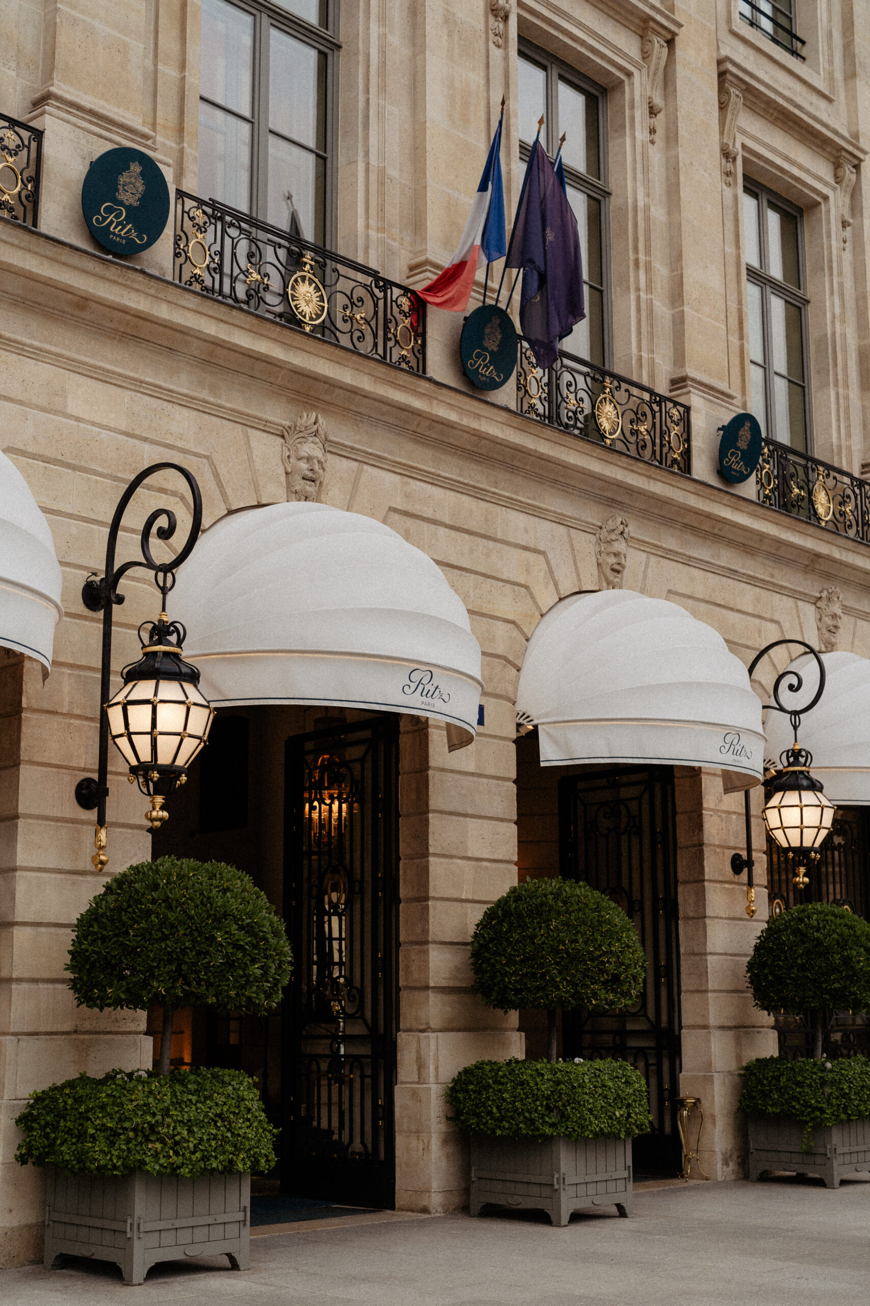 Destination wedding elopement at the luxurious Ritz Paris facade 