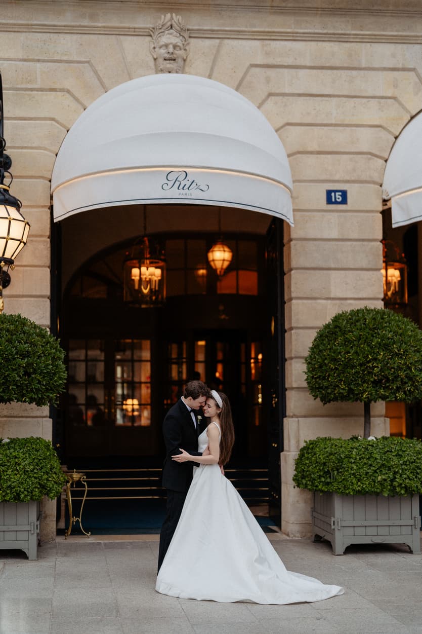 Destination wedding elopement at the luxurious Ritz Paris couple in front of the hotel