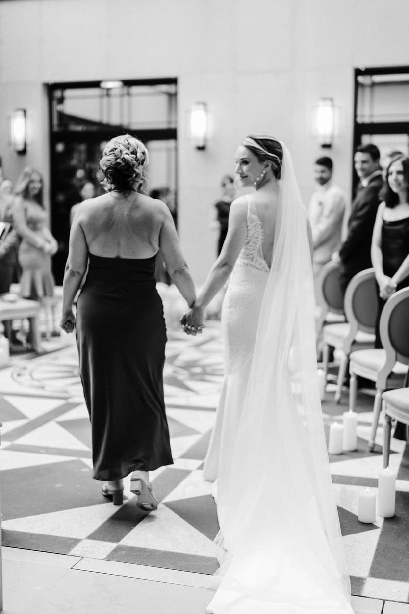 bride entrance wedding ceremony with mom