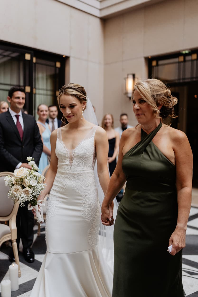 bride entrance wedding ceremony with mom