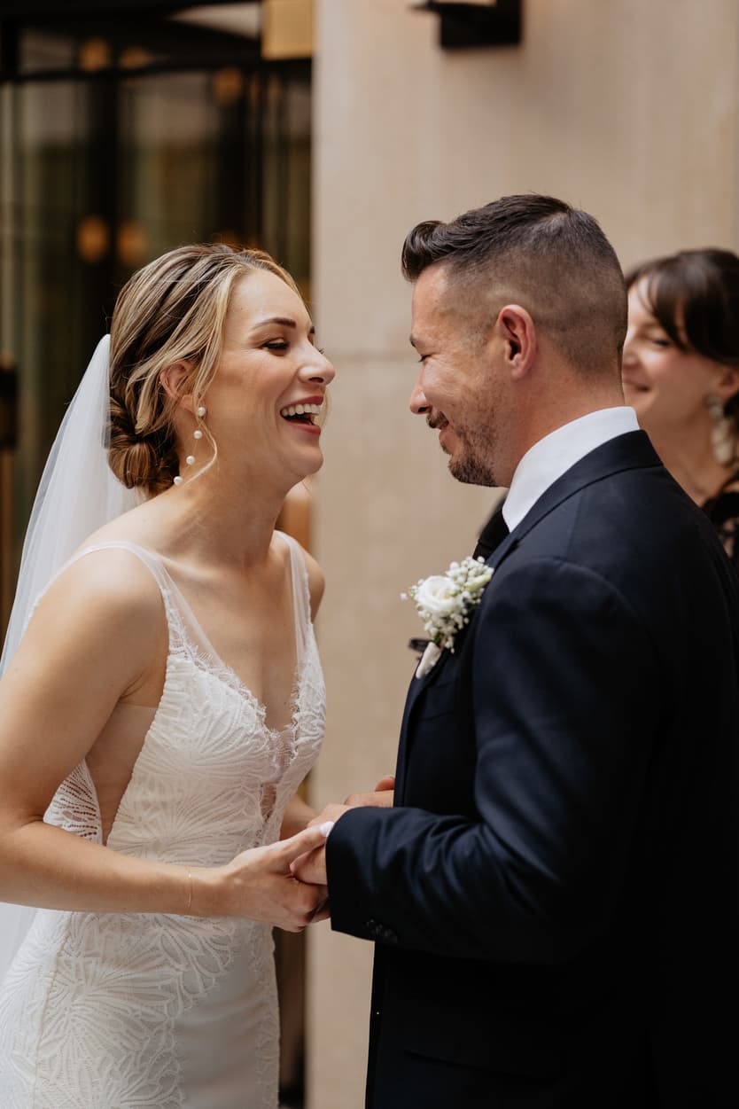 happy bride big laugh at wedding ceremony