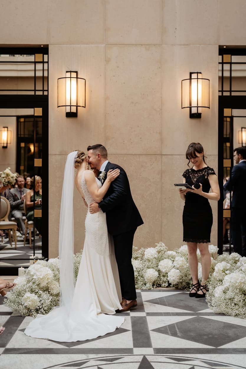 groom kiss bride after announced married