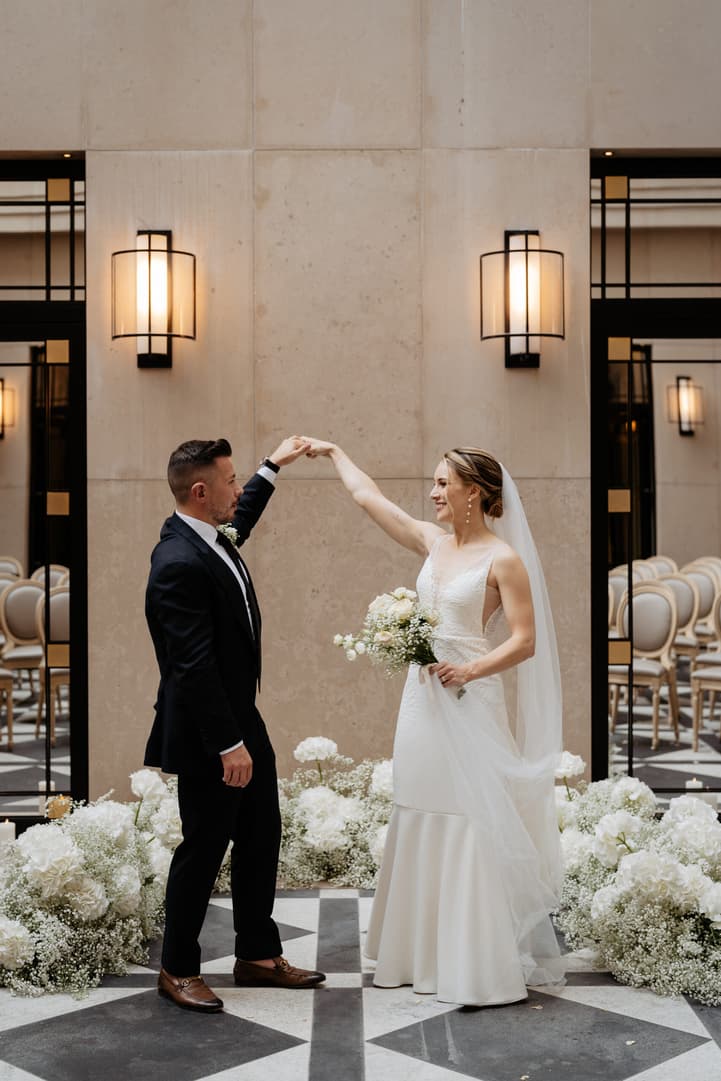 groom and bride dancing at wedding ceremony