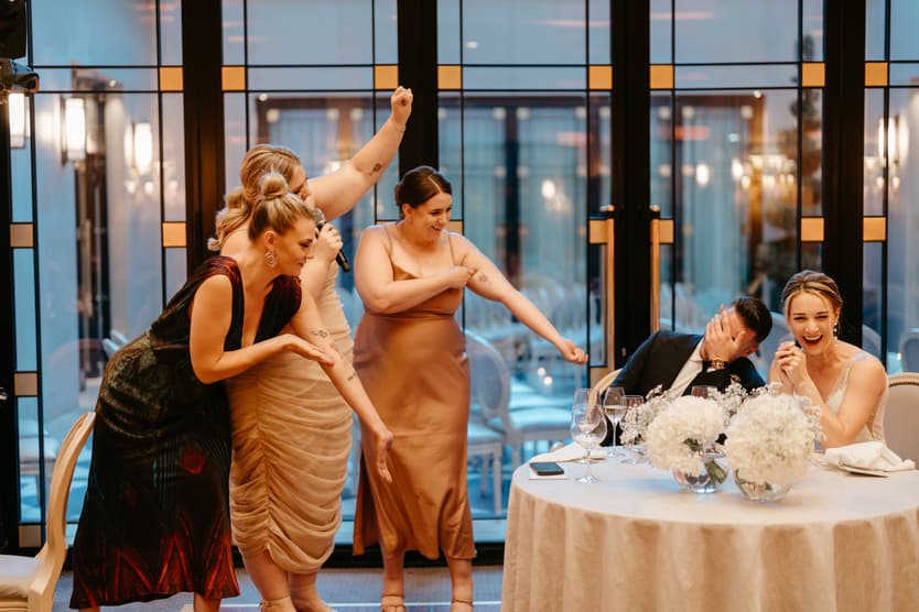 Bridemaid make a fun speech at dinner party