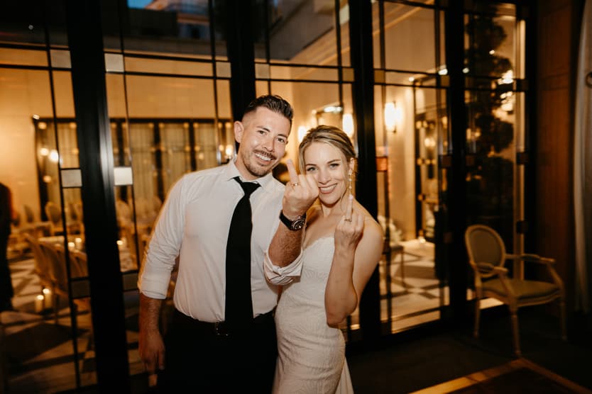 Groom and bride put ring finger