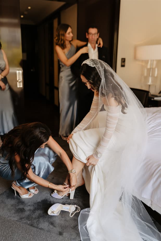 Jimmy Choo Bride getting ready  in Peninsula paris wedding rooftop photographer