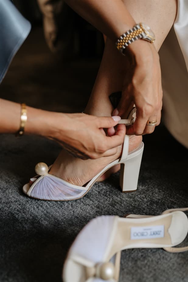 Jimmy Choo Bride getting ready  in Peninsula paris wedding rooftop photographer