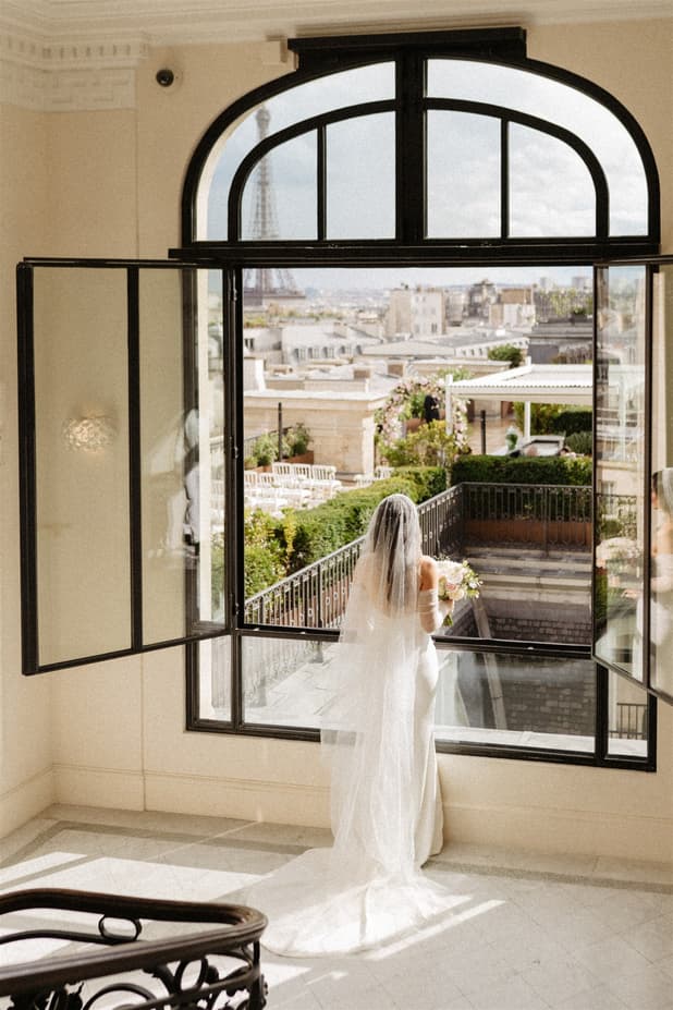 Bride getting ready in Peninsula paris wedding rooftop photographer