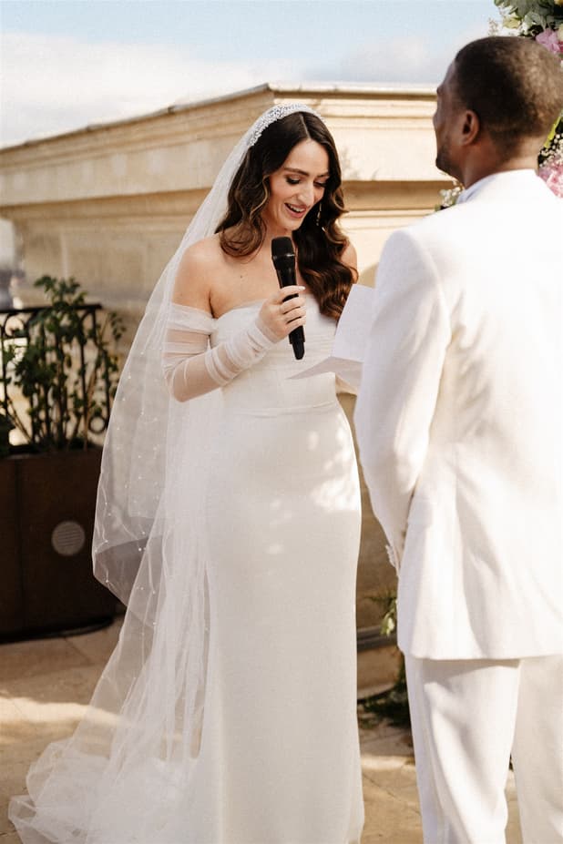 Bride and Groom exchanging vow at Paris Private Rooftop Wedding Ceremony at Peninsula Hotel with Eiffel Tower view