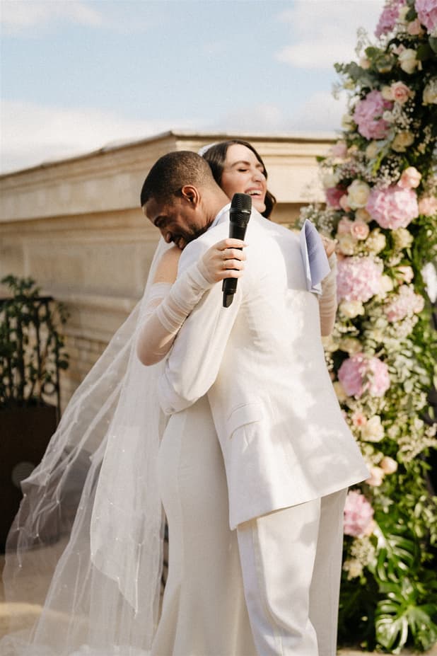 Bride and Groom exchanging vow at Paris Private Rooftop Wedding Ceremony at Peninsula Hotel with Eiffel Tower view