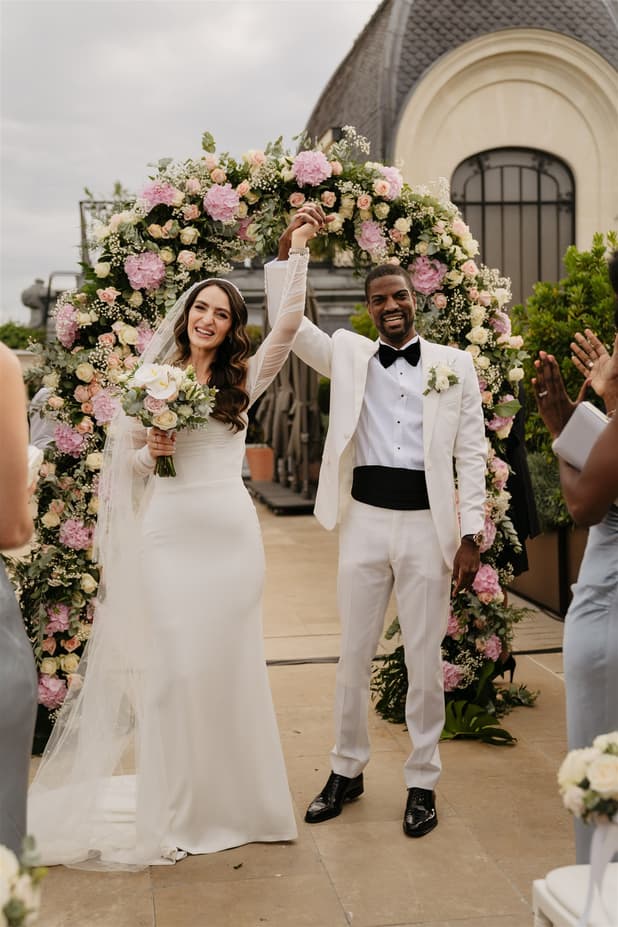 Groom and Bride happily celebrate their wedding