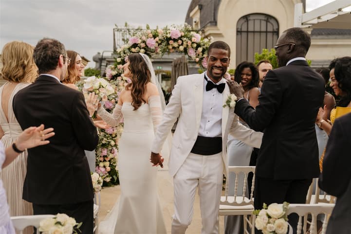 Black Groom and White Bride happily celebrate their wedding