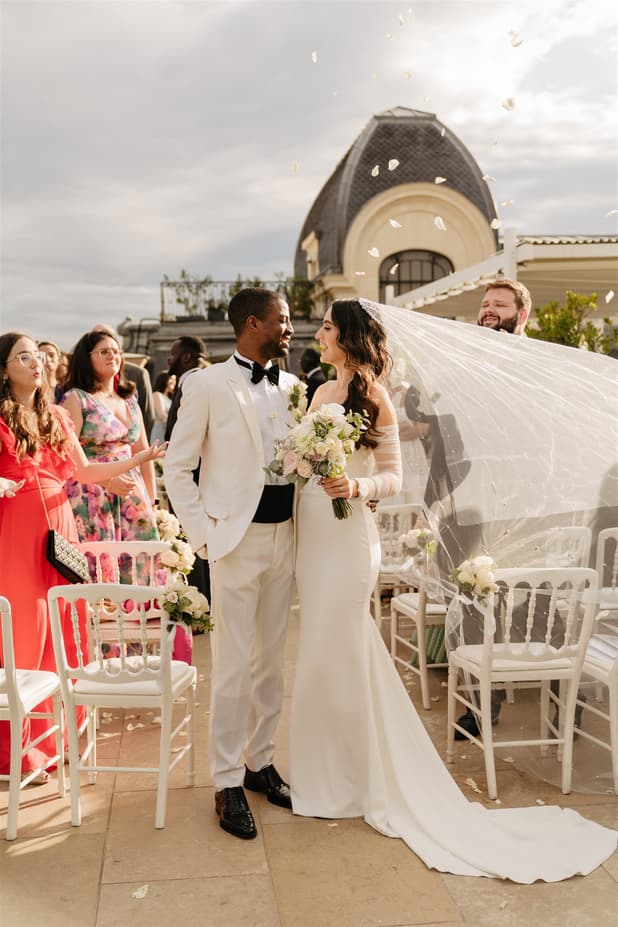 Black Groom and White Bride happily celebrate their wedding