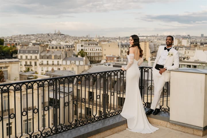 Black Groom and White Bride do after-wedding couple photosession at Private Terrace of Peninsula Paris 