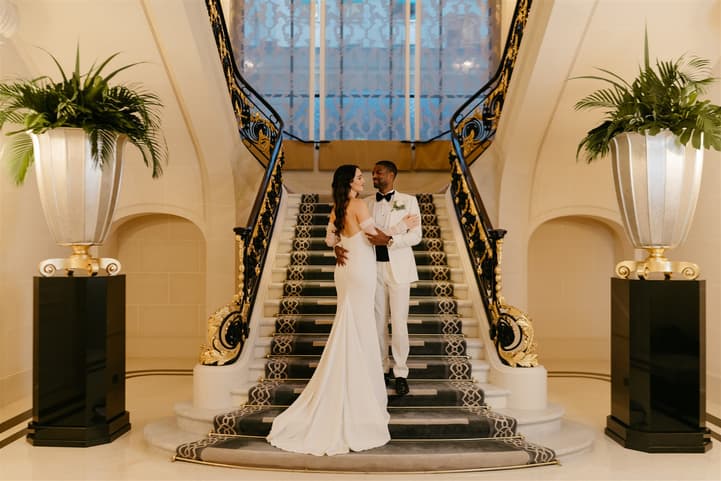 Black Groom and White Bride do after-wedding couple photosession at Peninsula Paris 