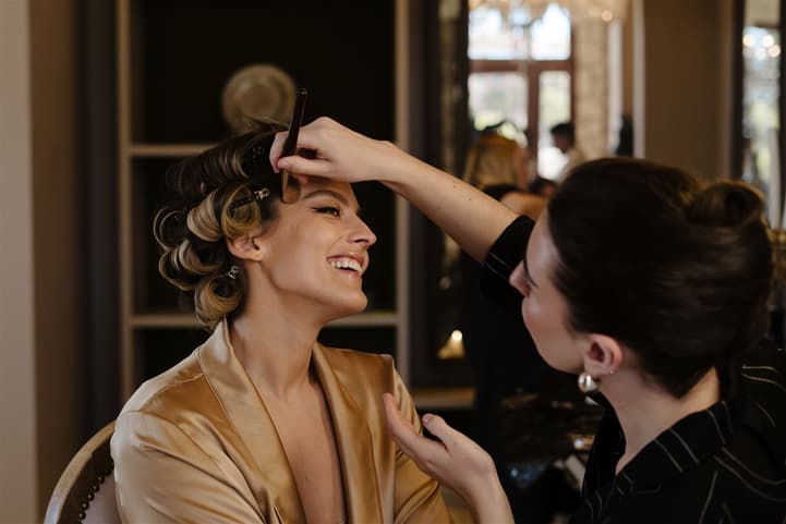 Bride getting makeup and hair on the wedding day in San Miguel de Allende Mexico