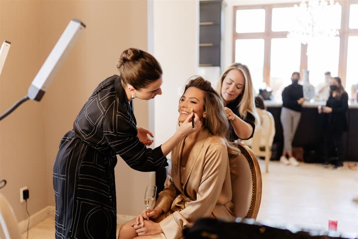 Bride getting makeup and hair on the wedding day in San Miguel de Allende Mexico
