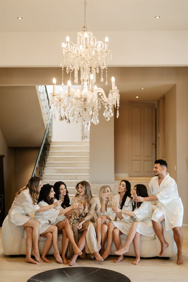 Bride celebrates preparation moment with friends photographer on the wedding day in San Miguel de Allende Mexico