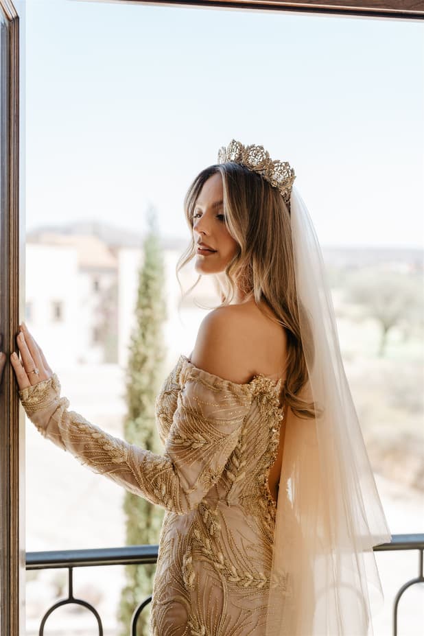 Untraditional elegance bride in her own design unique beige wedding gown photographer