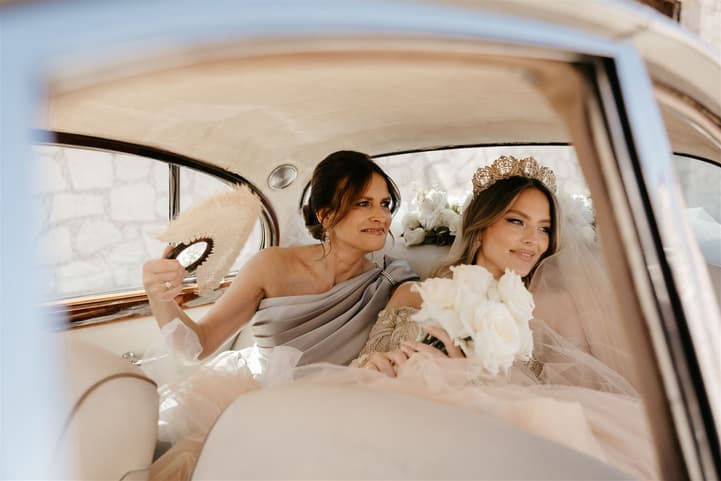 Bride and Mom's bride goes to wedding on a vintage car in San Miguel de Allende Mexico