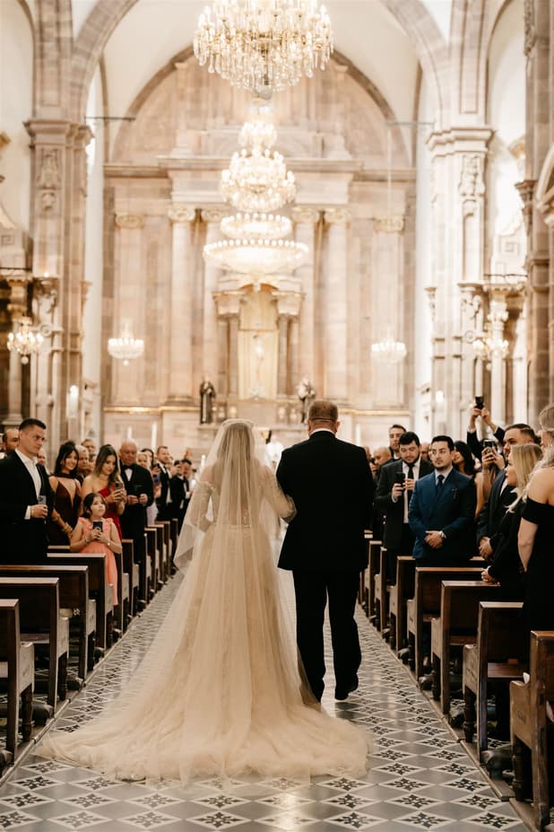 Bride entrance moment at the ceremony in the church Iglesia de San Francisco