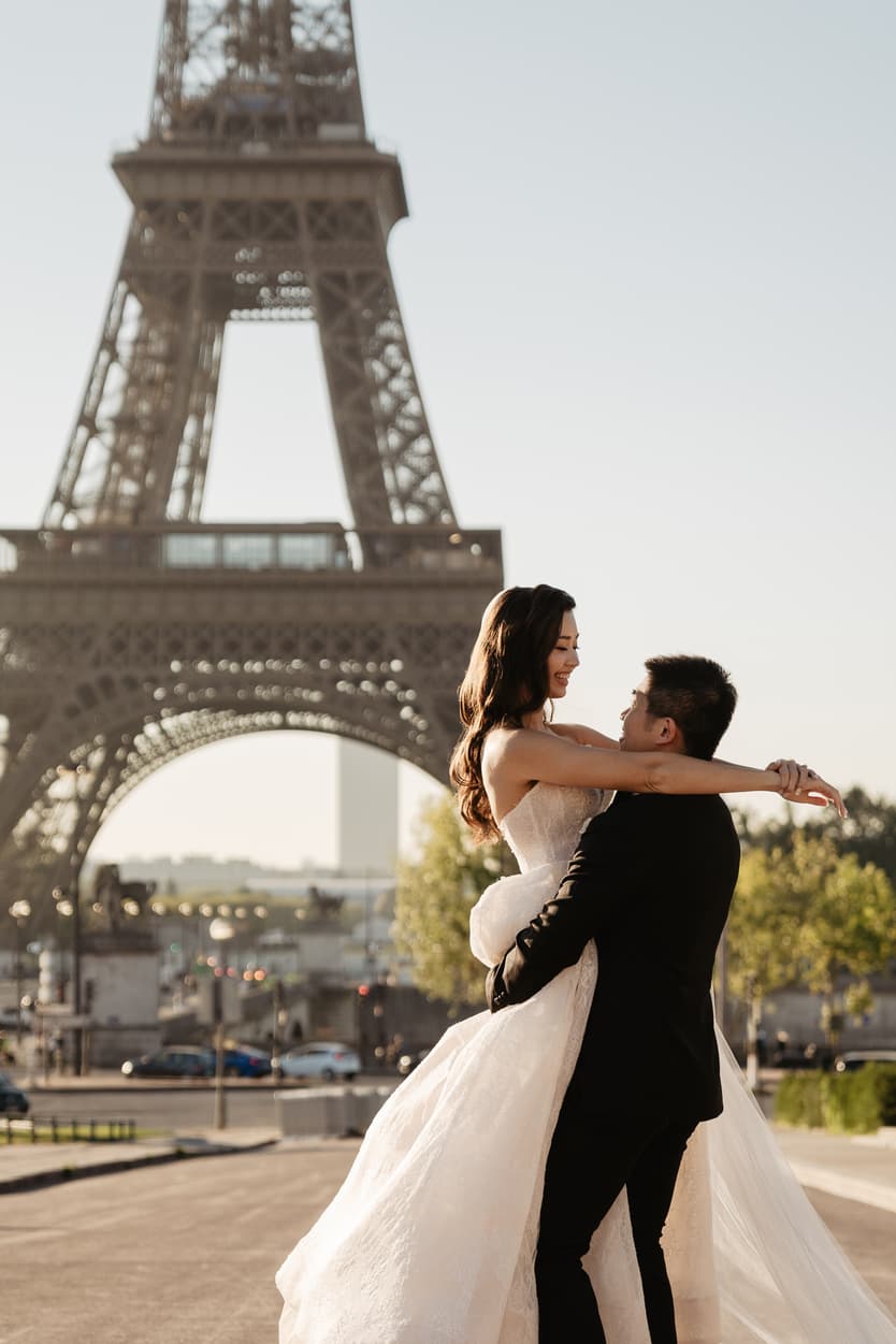 Bride wearing Monique Lhuillier for her pre wedding in Paris at Place Trocadéro with Eiffel Tower view