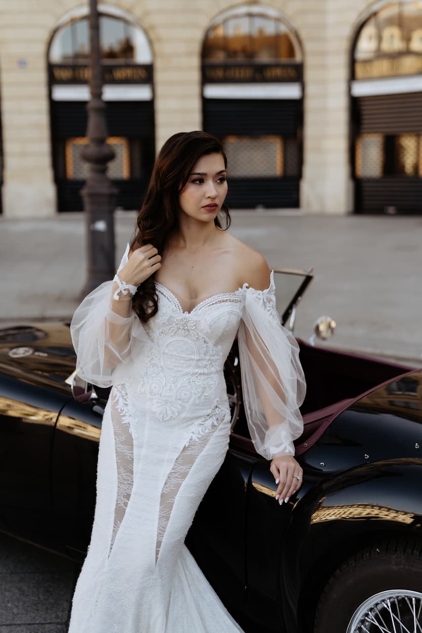 bride wearing Galia Lahav for her wedding in Paris at Place Vendome vintage car