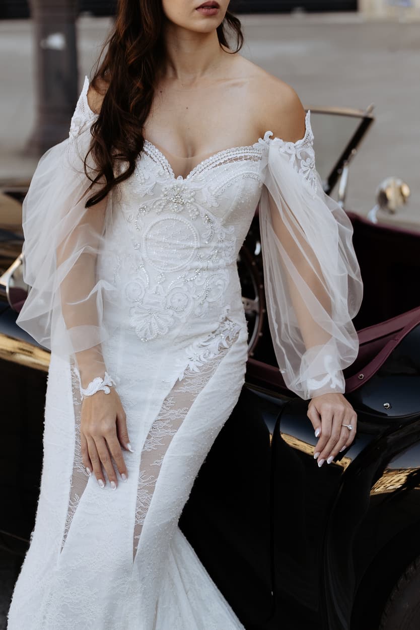 bride wearing Galia Lahav for her wedding in Paris at Place Vendome vintage car