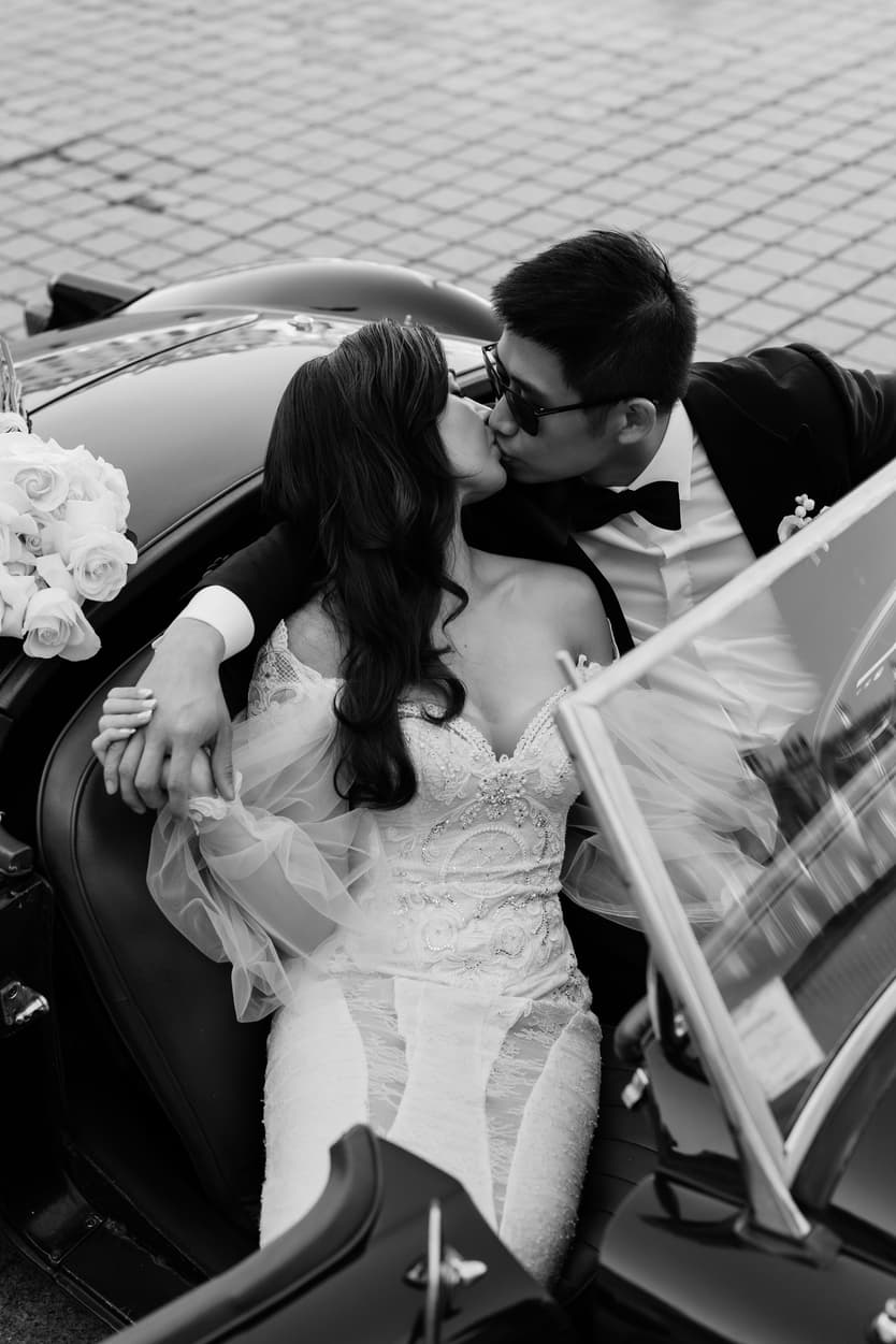 bride wearing Galia Lahav for her wedding in Paris at Place Vendome Vintage car