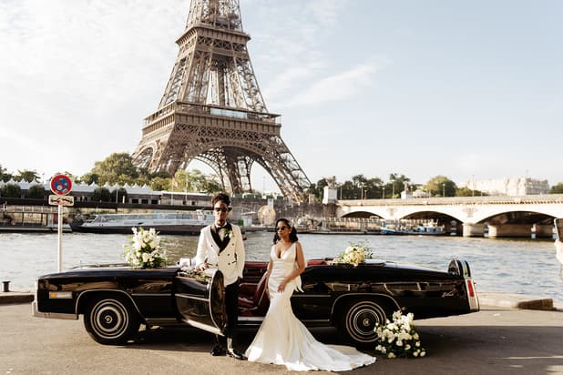 couple elopement with vintage car in front of Eiffel tower Paris