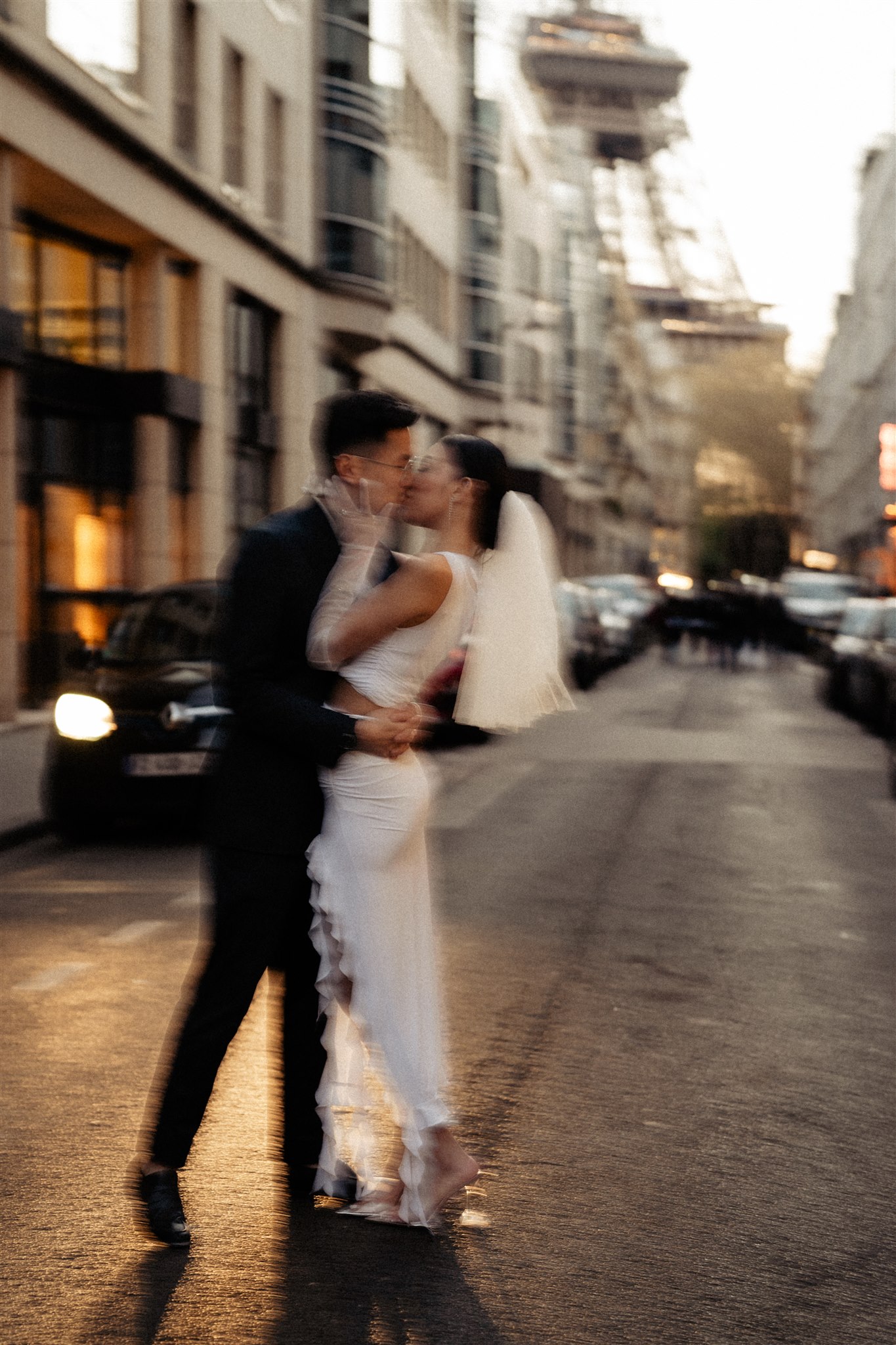 sunset couple photos in paris blurry moody vibes