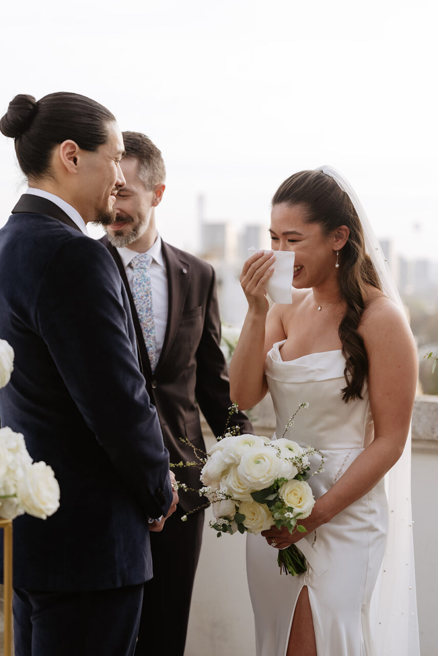 Eiffel tower terrace elopement bride crying