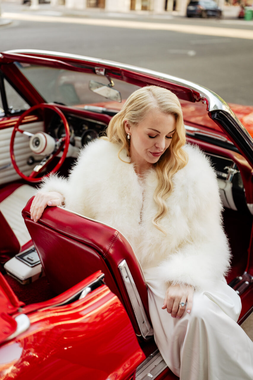 Bride in a vintage mustang car in an old hollywood elopement Paris