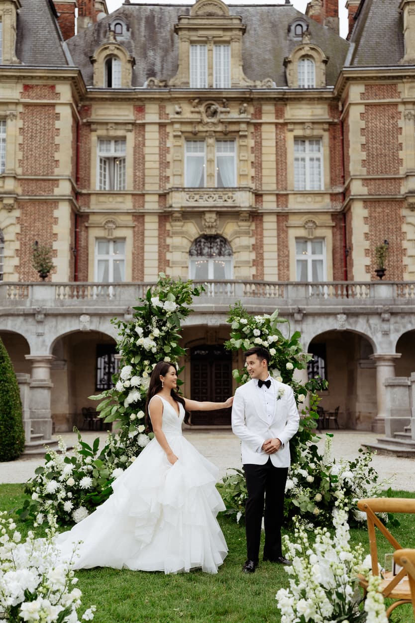 Bride and groom first look at destination wedding at Château Bouffémont