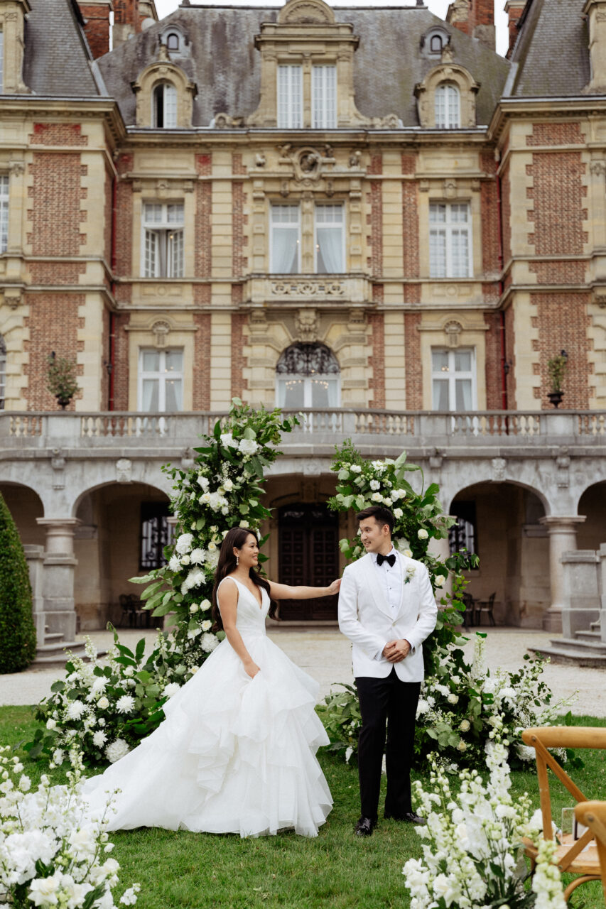 Bride and groom first look at destination wedding at Château Bouffémont