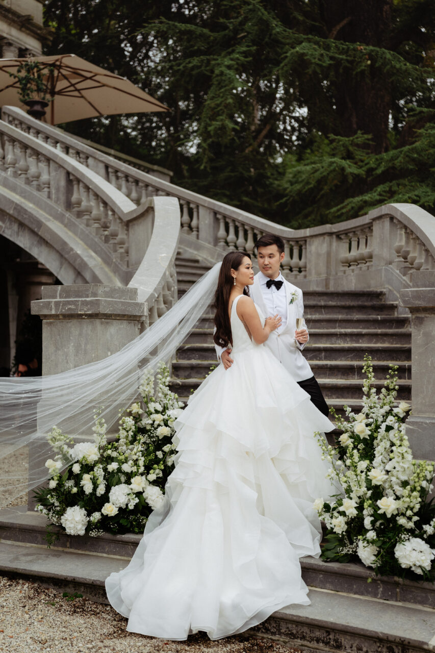 Bride and groom wedding at Château Bouffémont stairs