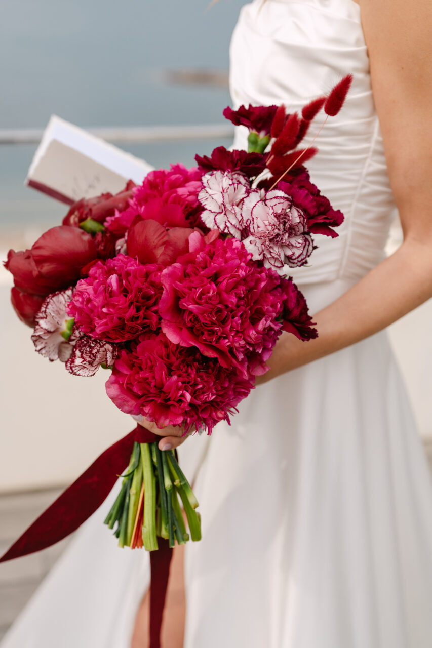 Elopement at Chateau Theoule in the South of France burgundy bouquet