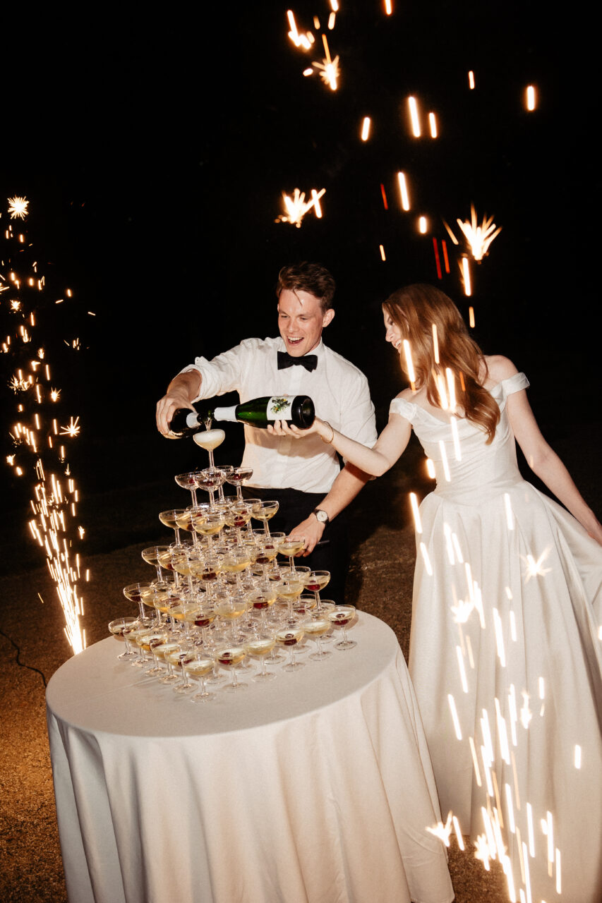 Champagne tower at destination wedding Château du Grand Lucé