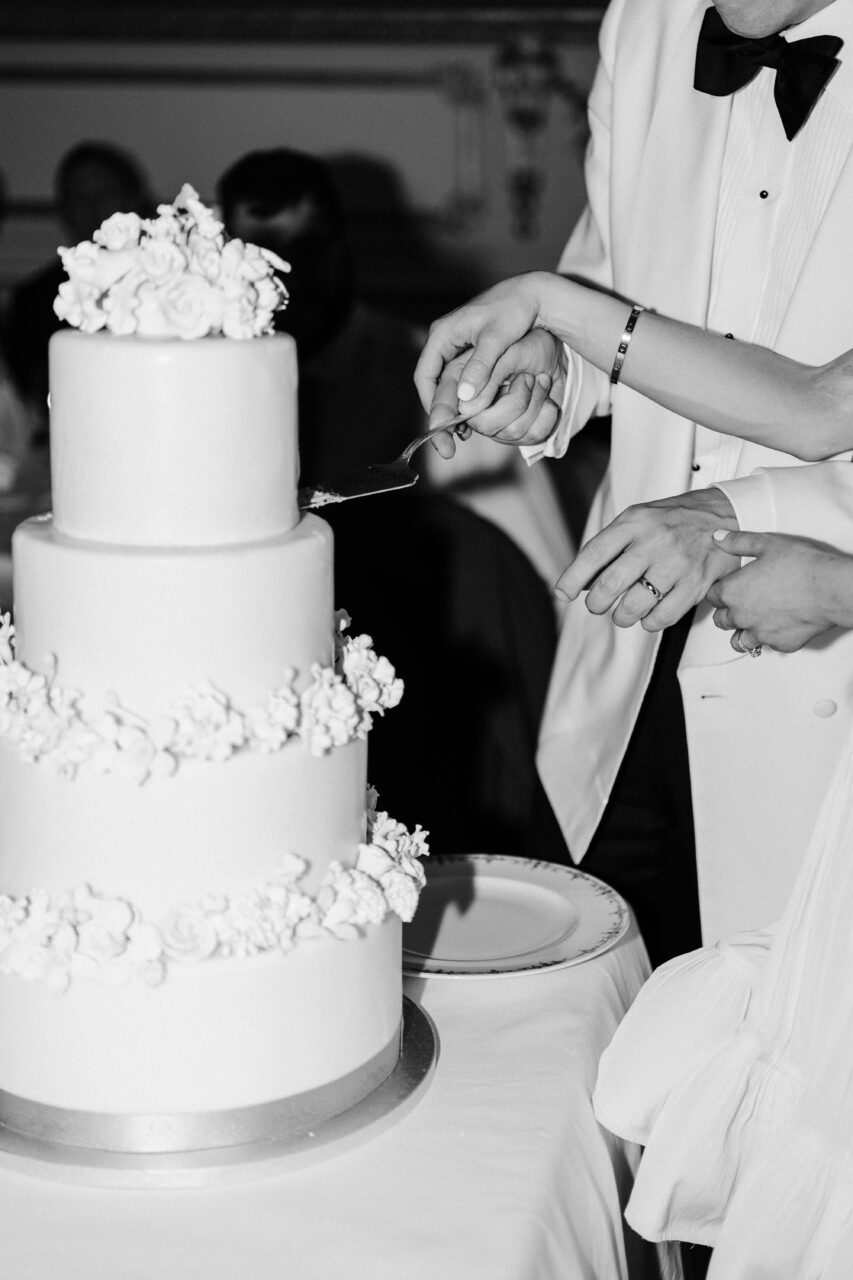 the ritz wedding cutting cake