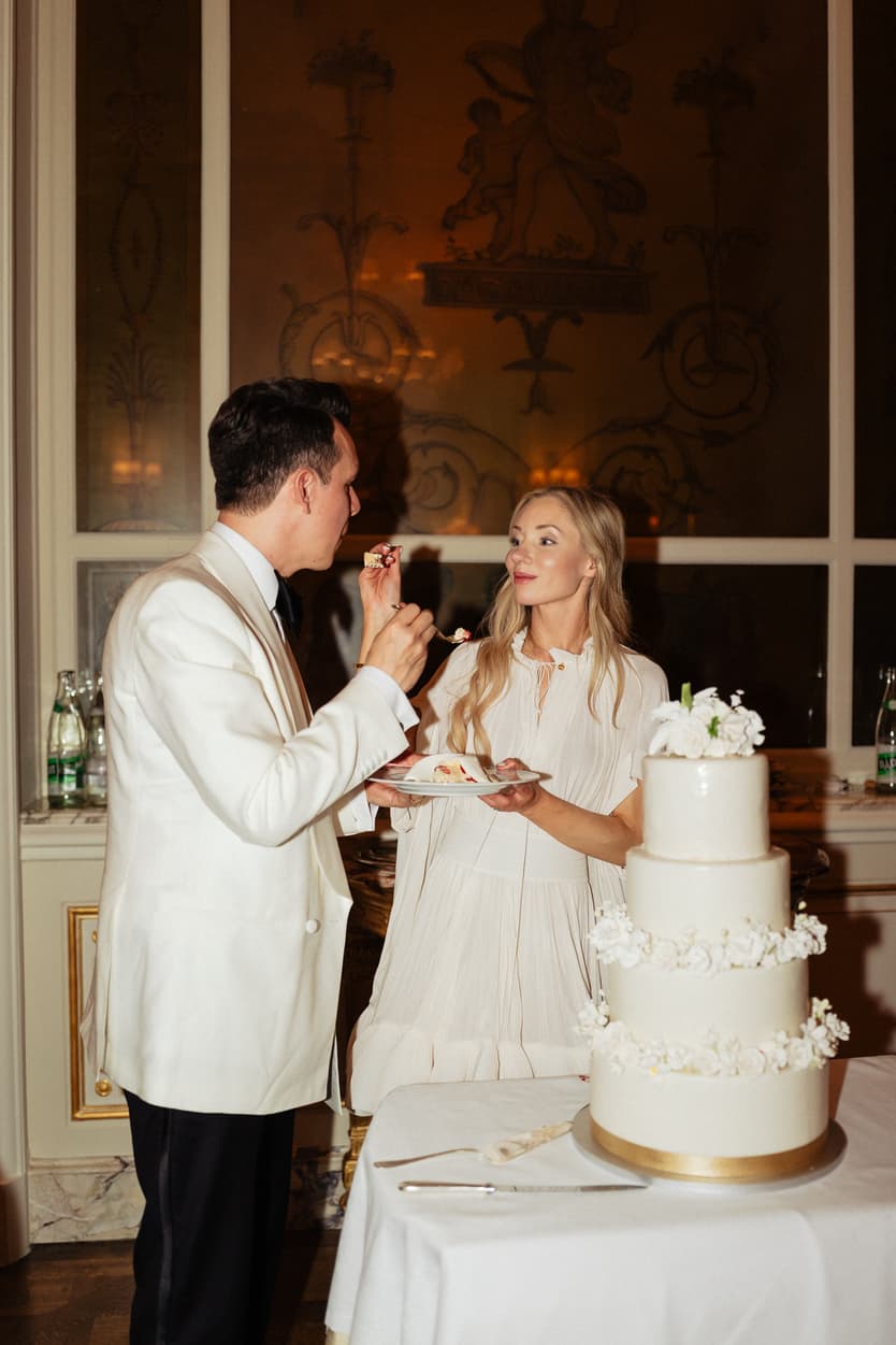 the ritz wedding cutting cake