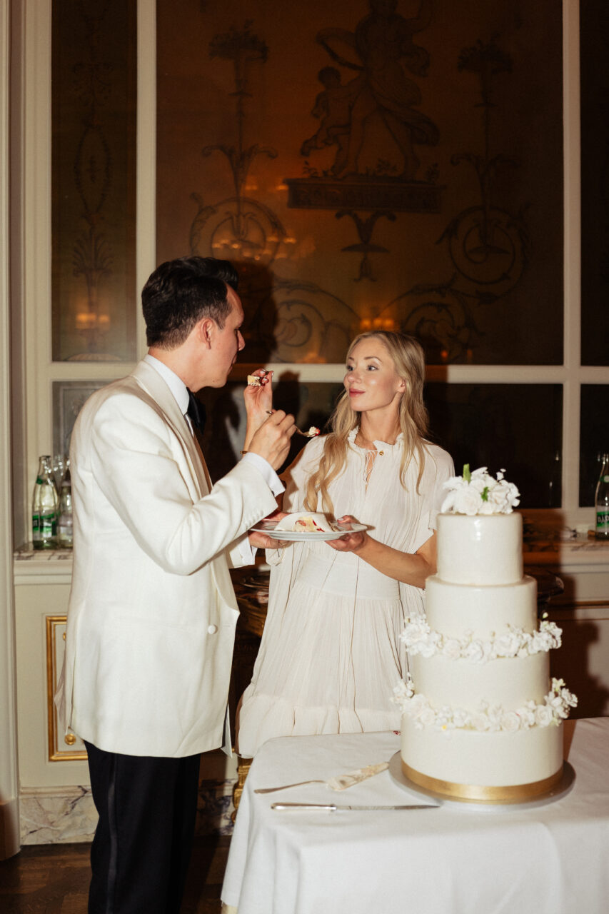 the ritz wedding cutting cake